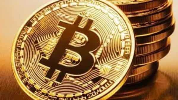Unlike fiat money, where bank deposits can be depreciated due to inflation controlled by the government, both bitcoins and gold are independent from the government. (iStock)
